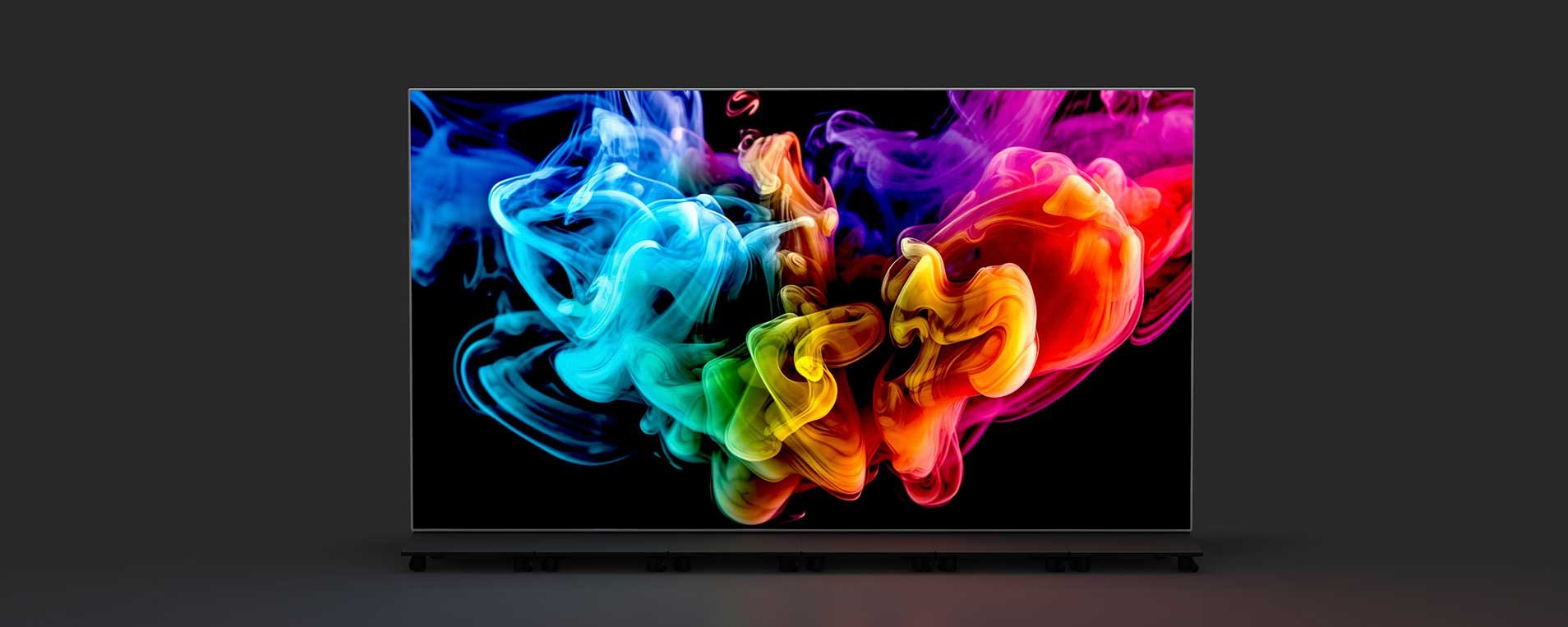 Bunte Farbwolken auf schwarzem Hintergrund.