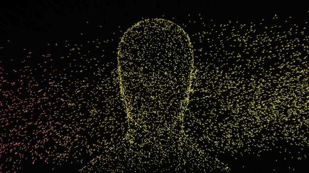 Ein abstraktes Gesicht aus leuchtenden Punkten vor dunklem Hintergrund.